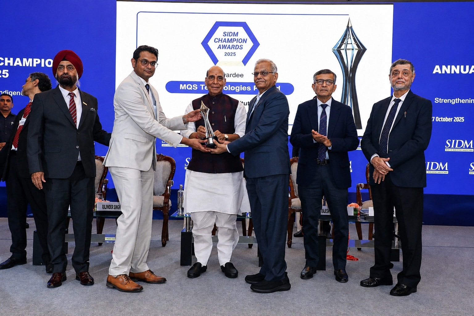 MQS Technologies receiving the SIDM Champion Award 2025
