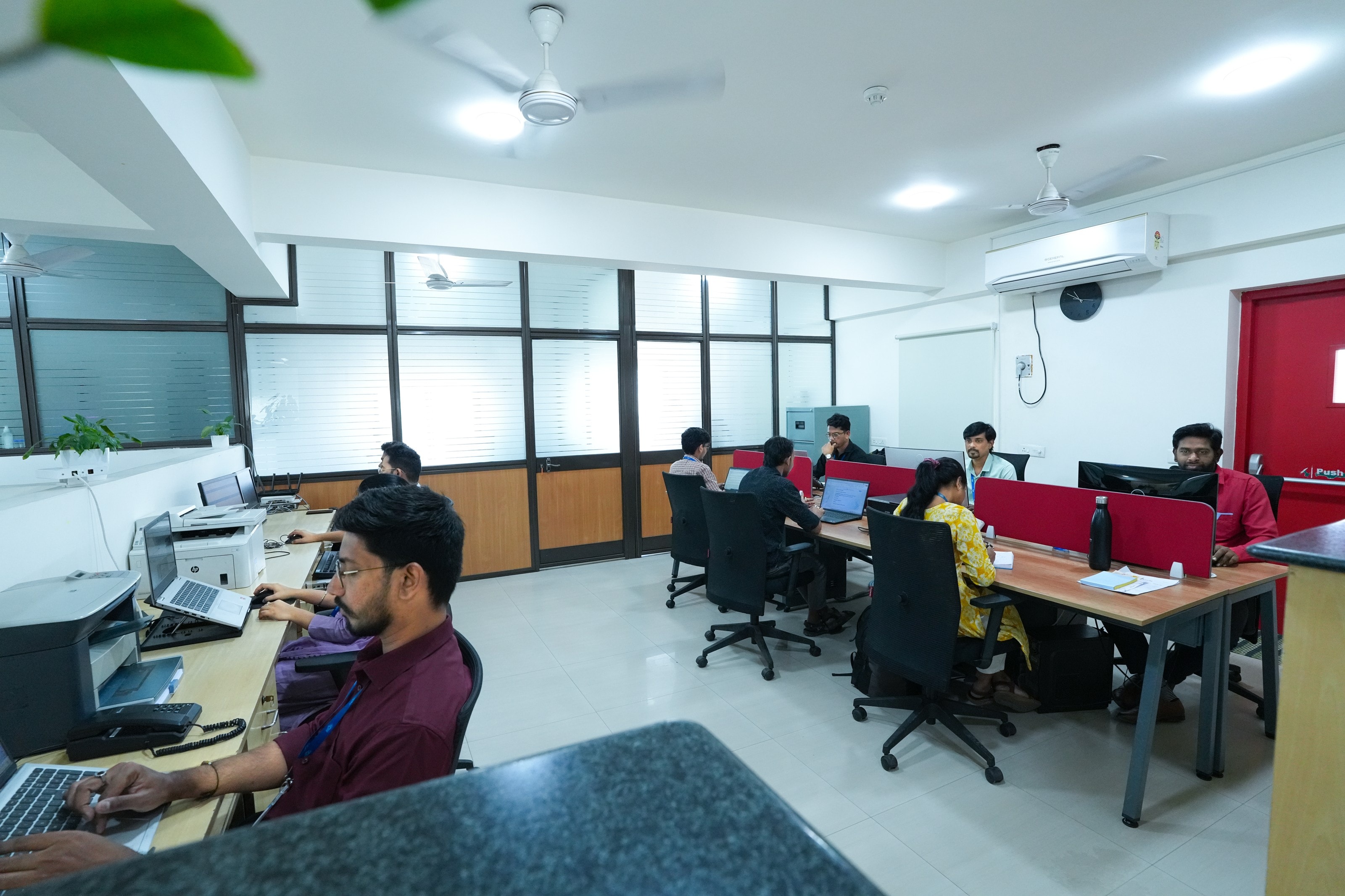 Engineers at work in the MQS Technologies office